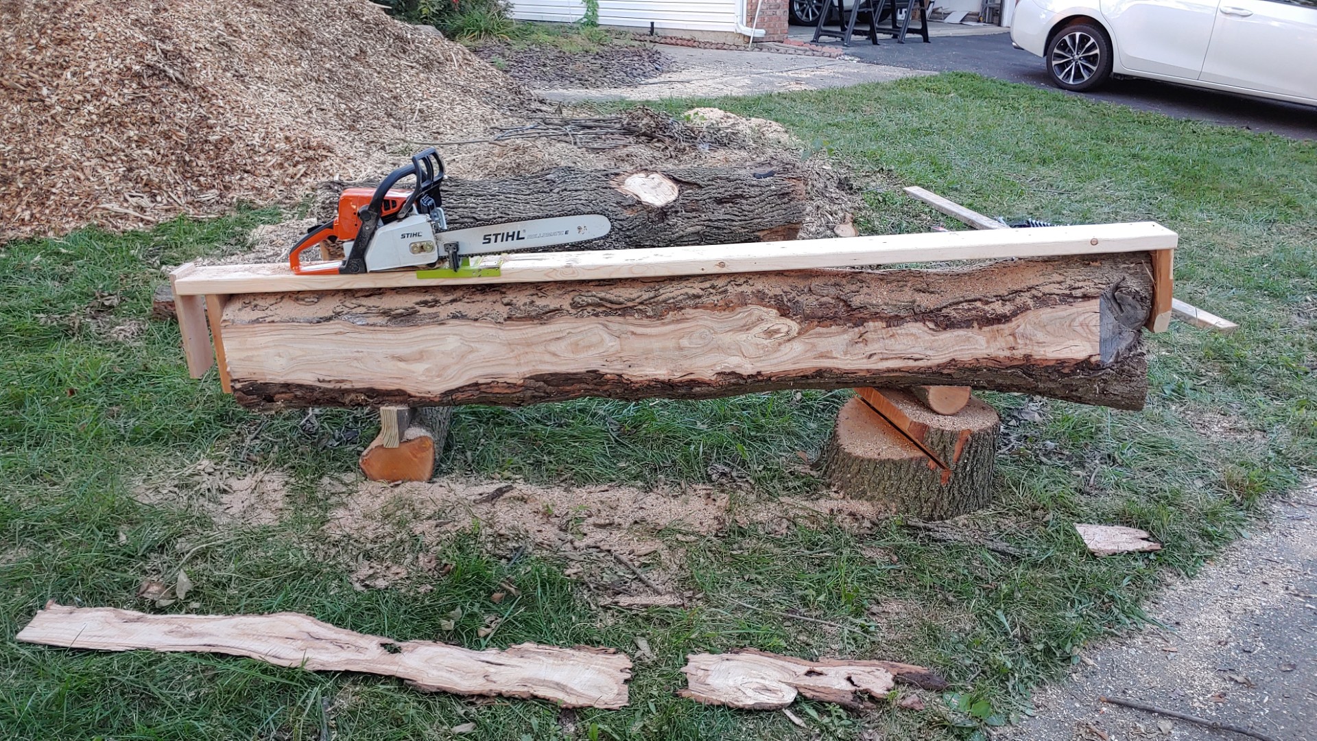 Log with outside edge milled flat