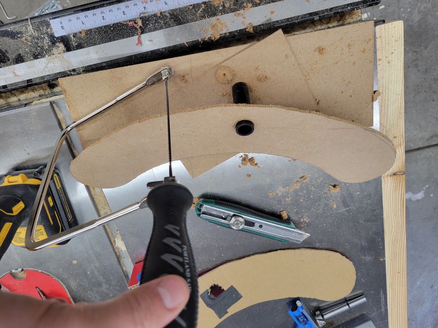 Fiberboard with coping saw